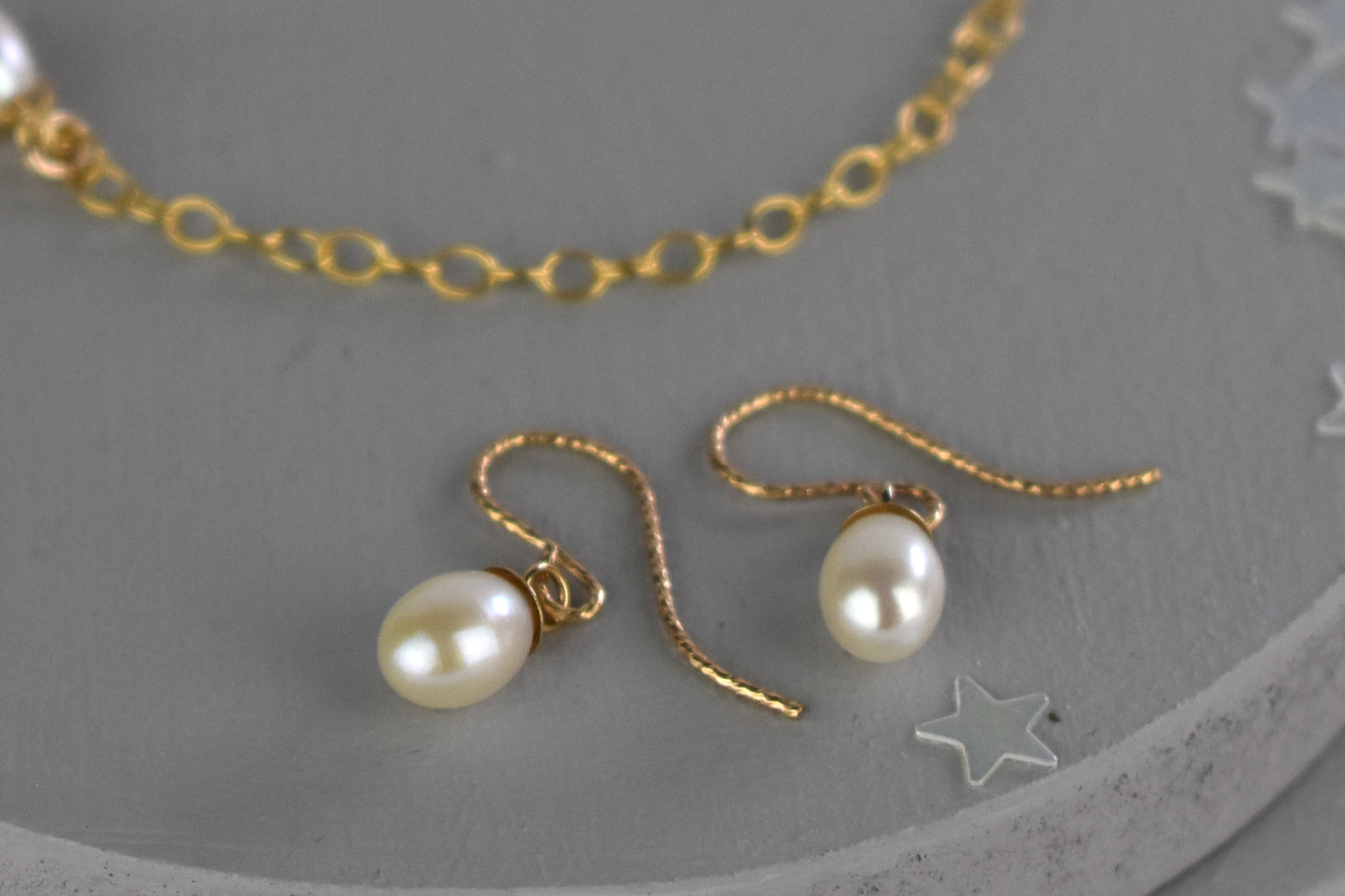 AAA quality Freshwater pearls on gold earwires.