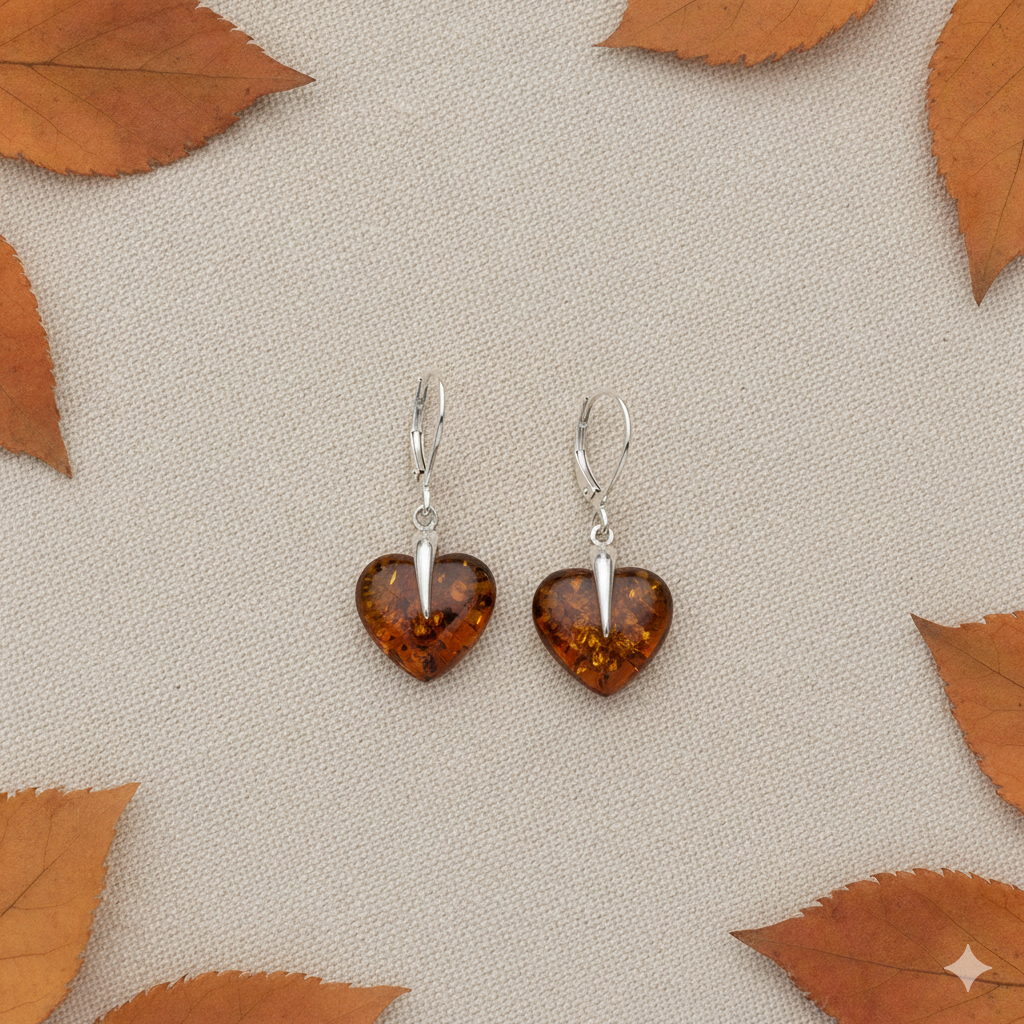 Cognac amber heart earrings. On sterling silver lever back wires
