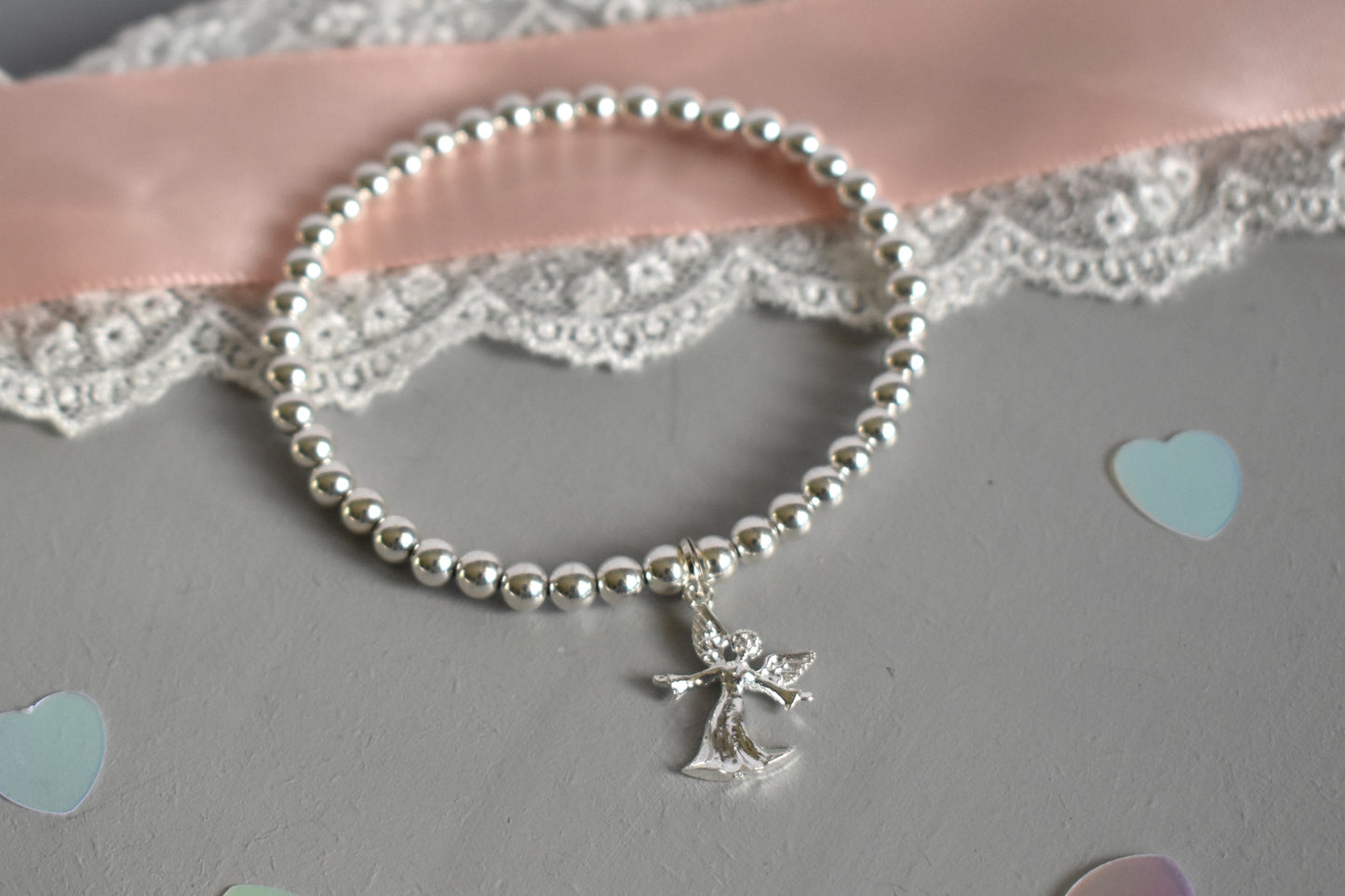 Sterling silver beaded bracelet with 4mm beads and a 16mm sterling silver angel charm
