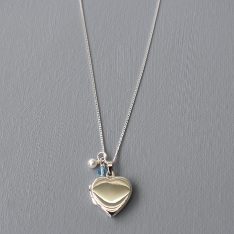 Sterling silver heart locket with cream pearl and blue  crystal
