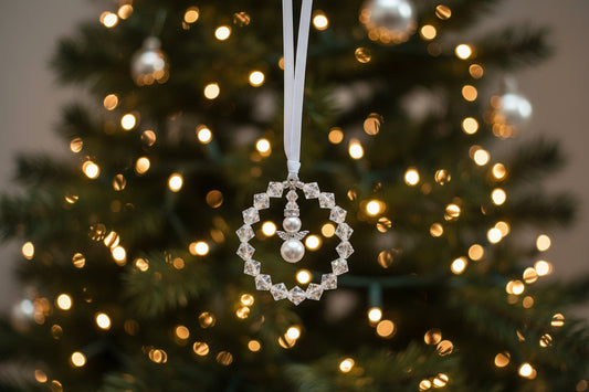 Mini Angel Christmas tree decoration. A circle of crystals with a pearl angel in the centre