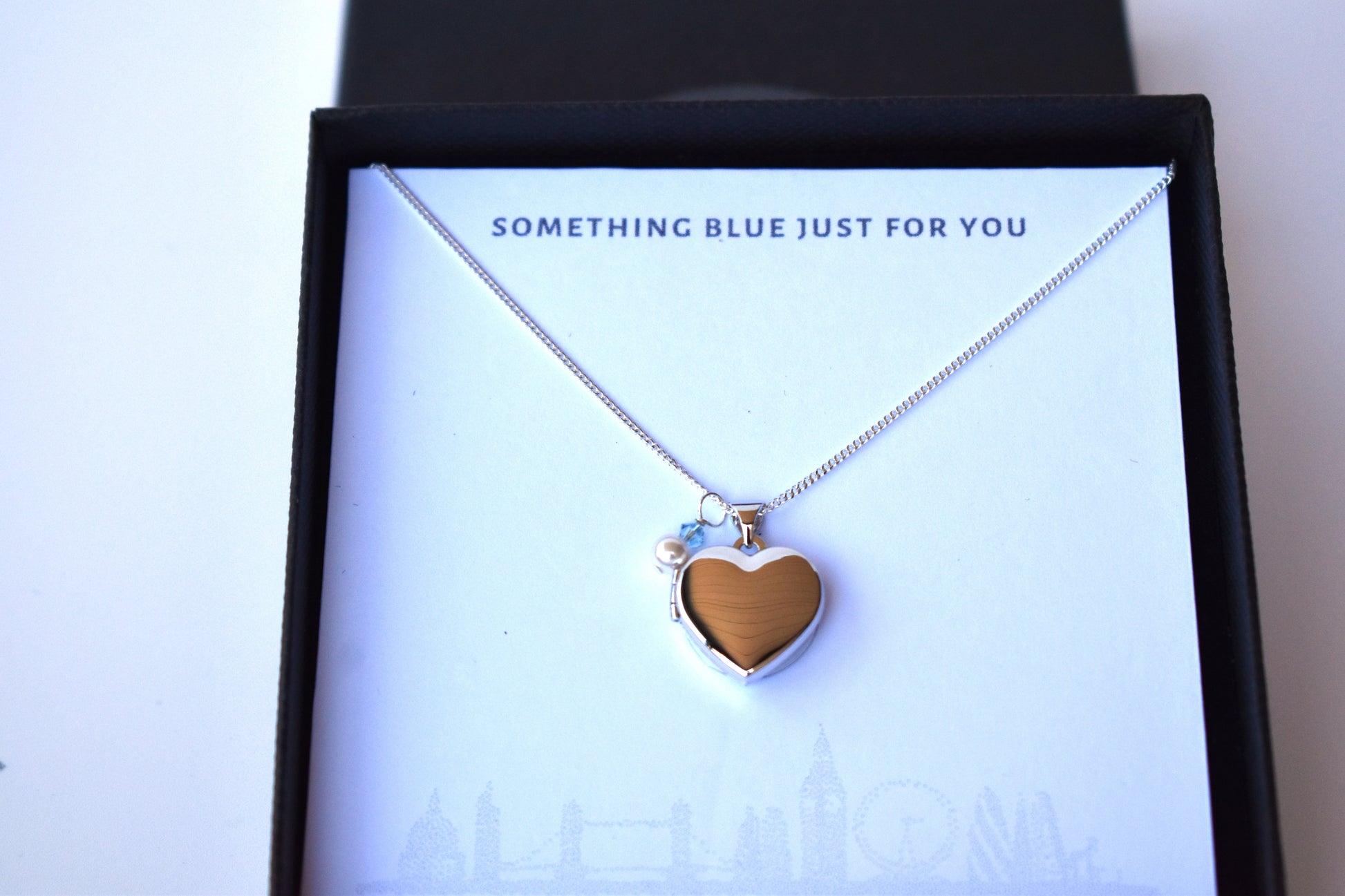 Sterling silver heart locket with cream pearl and blue  crystal in gift box