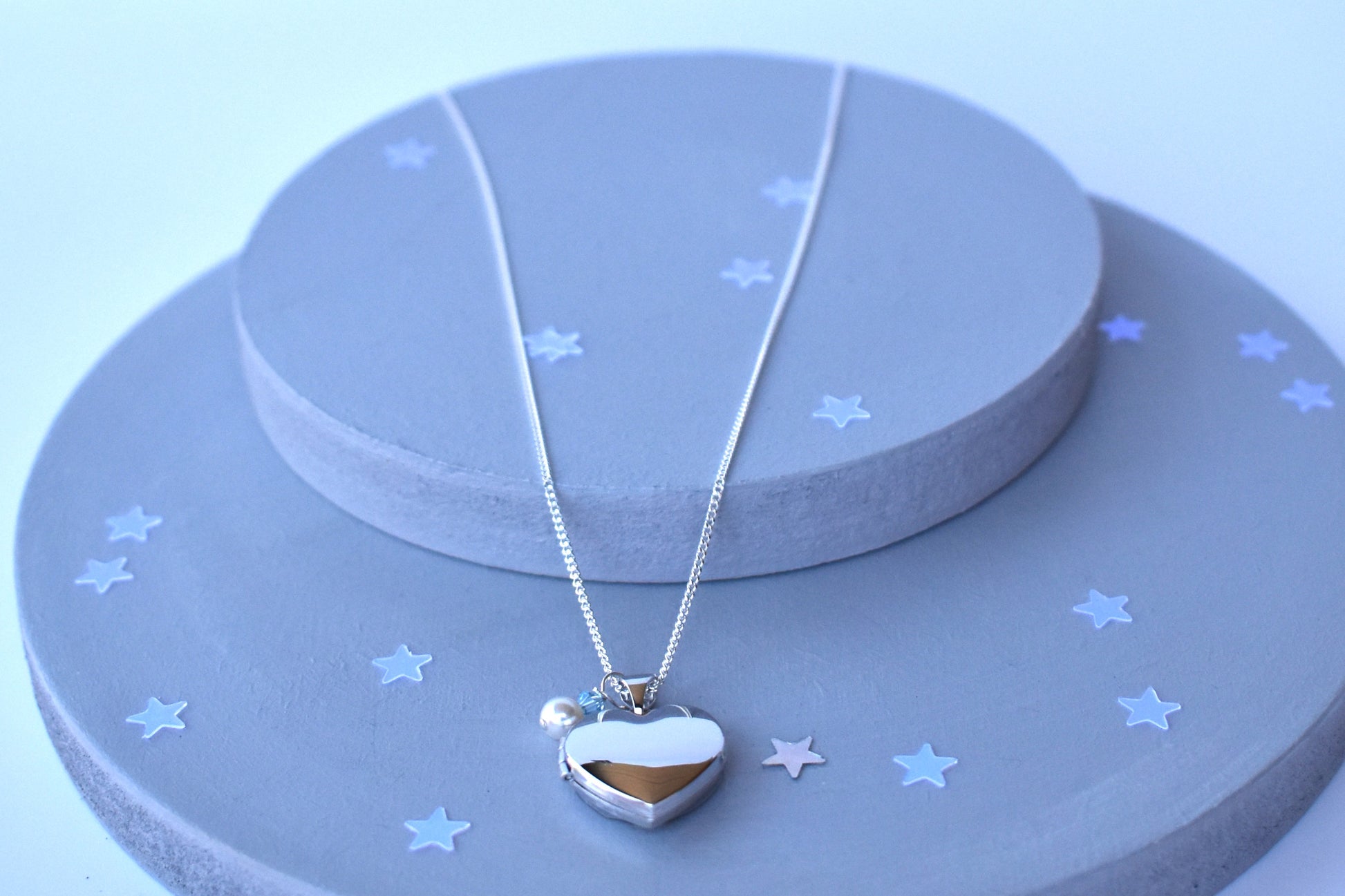 Sterling silver heart locket with cream pearl and blue  crystal