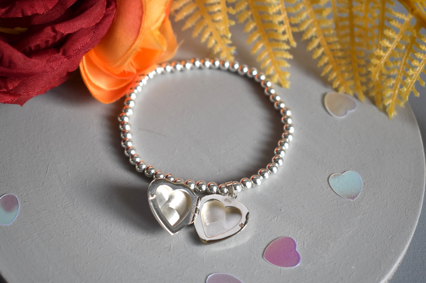 Sterling silver beaded bracelet with opening photo locket
