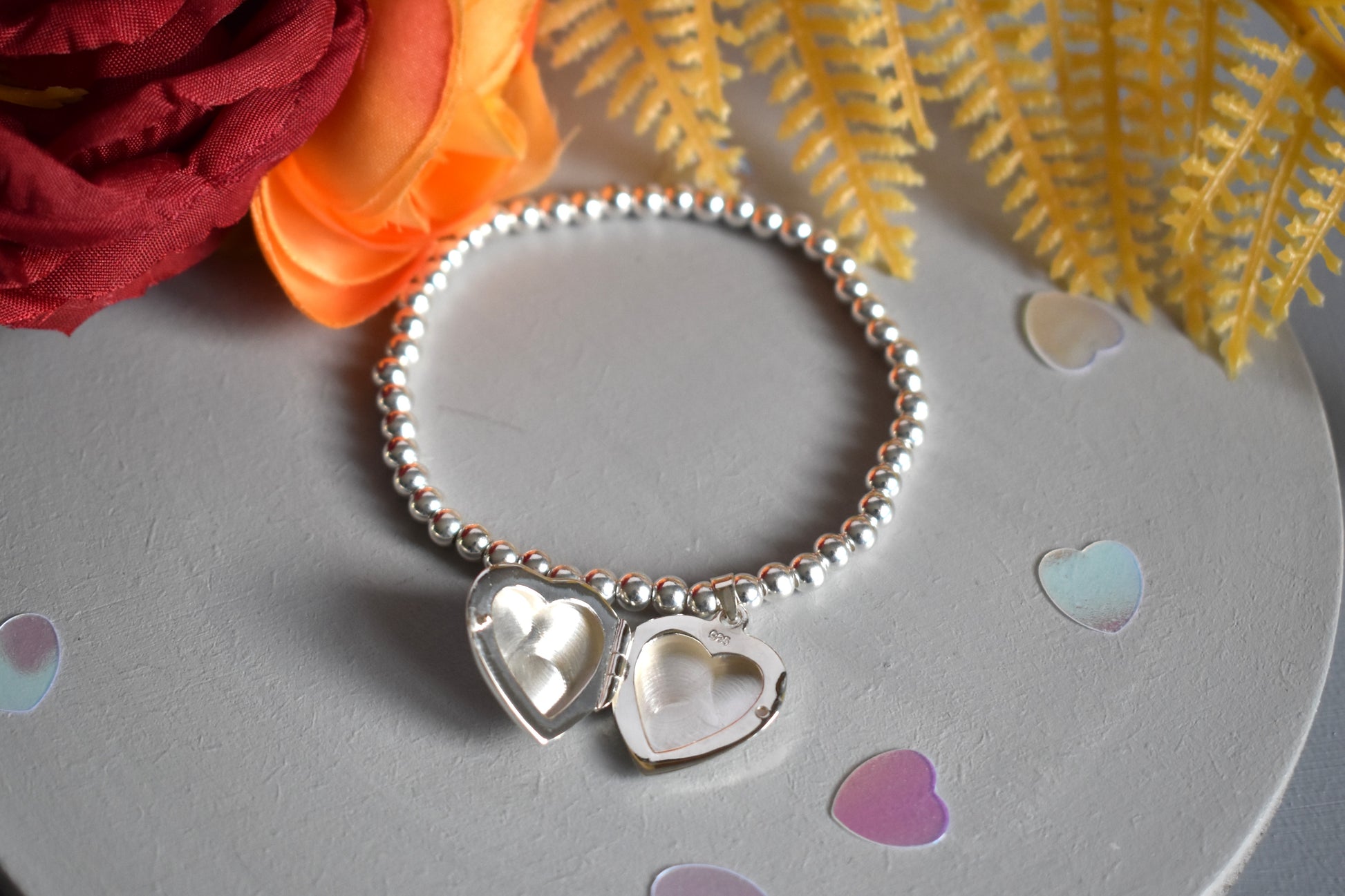 Sterling silver beaded bracelet with opening photo locket