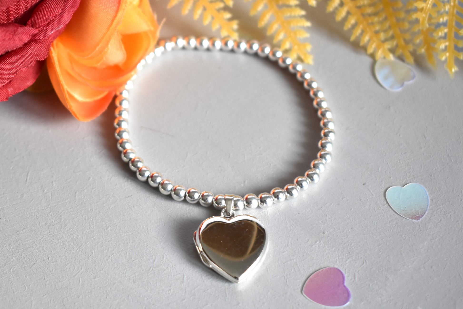 Sterling silver beaded bracelet with opening photo locket