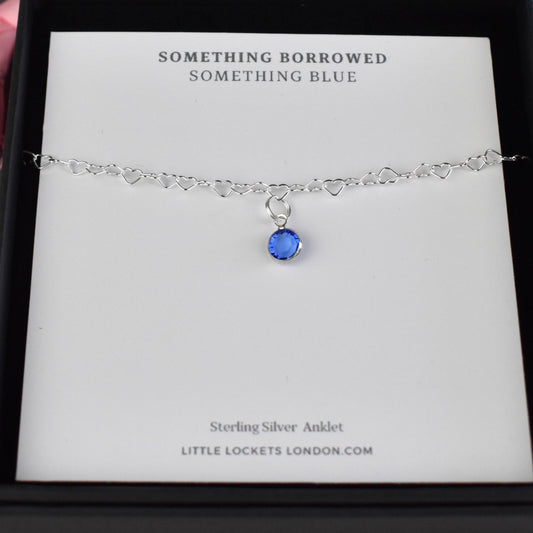 Sterling Silver heart link anklet with blue Swarovski crystal drop shown in gift box