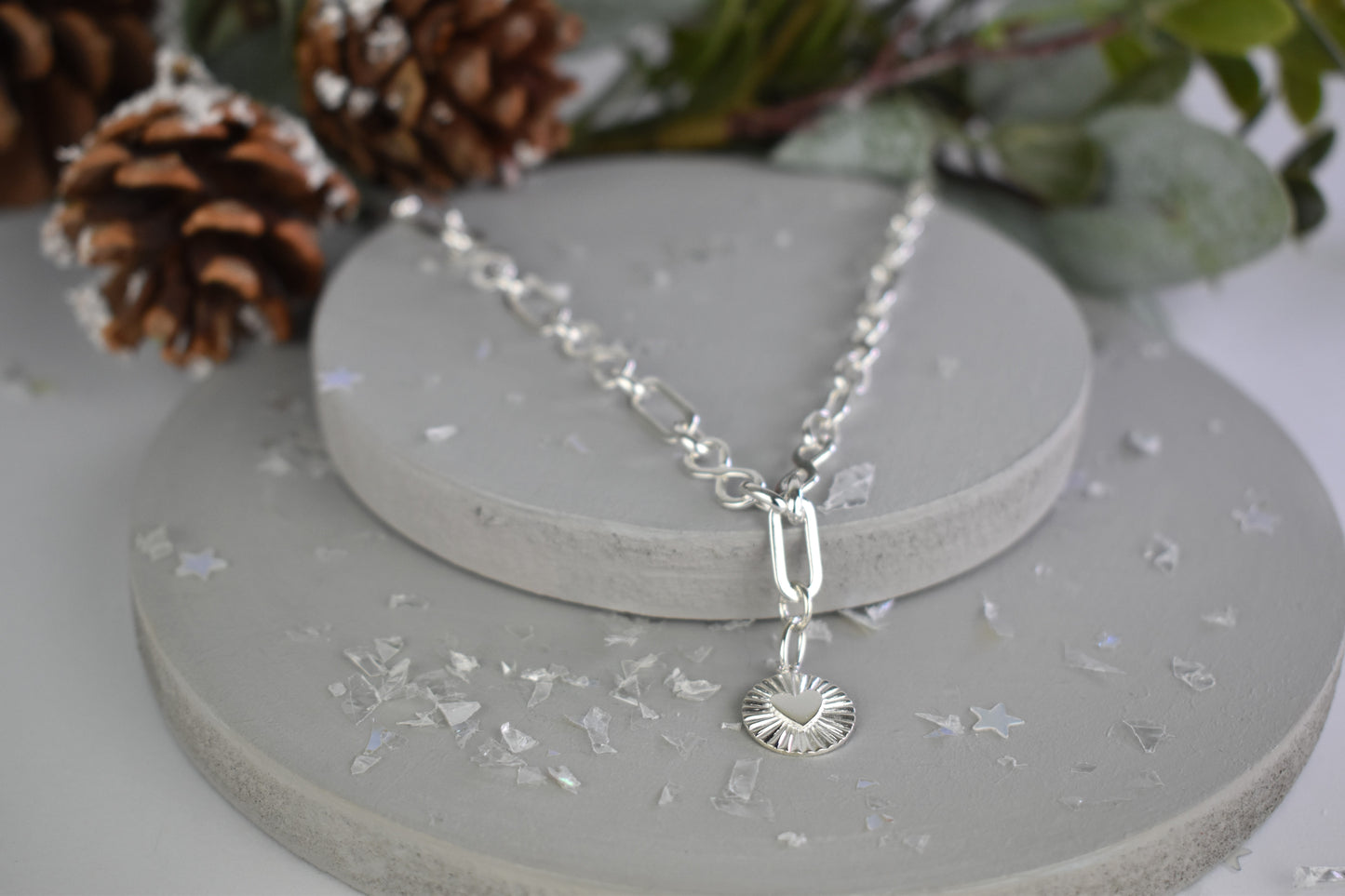 Sterling silver infinity link necklace with sunburst pendant