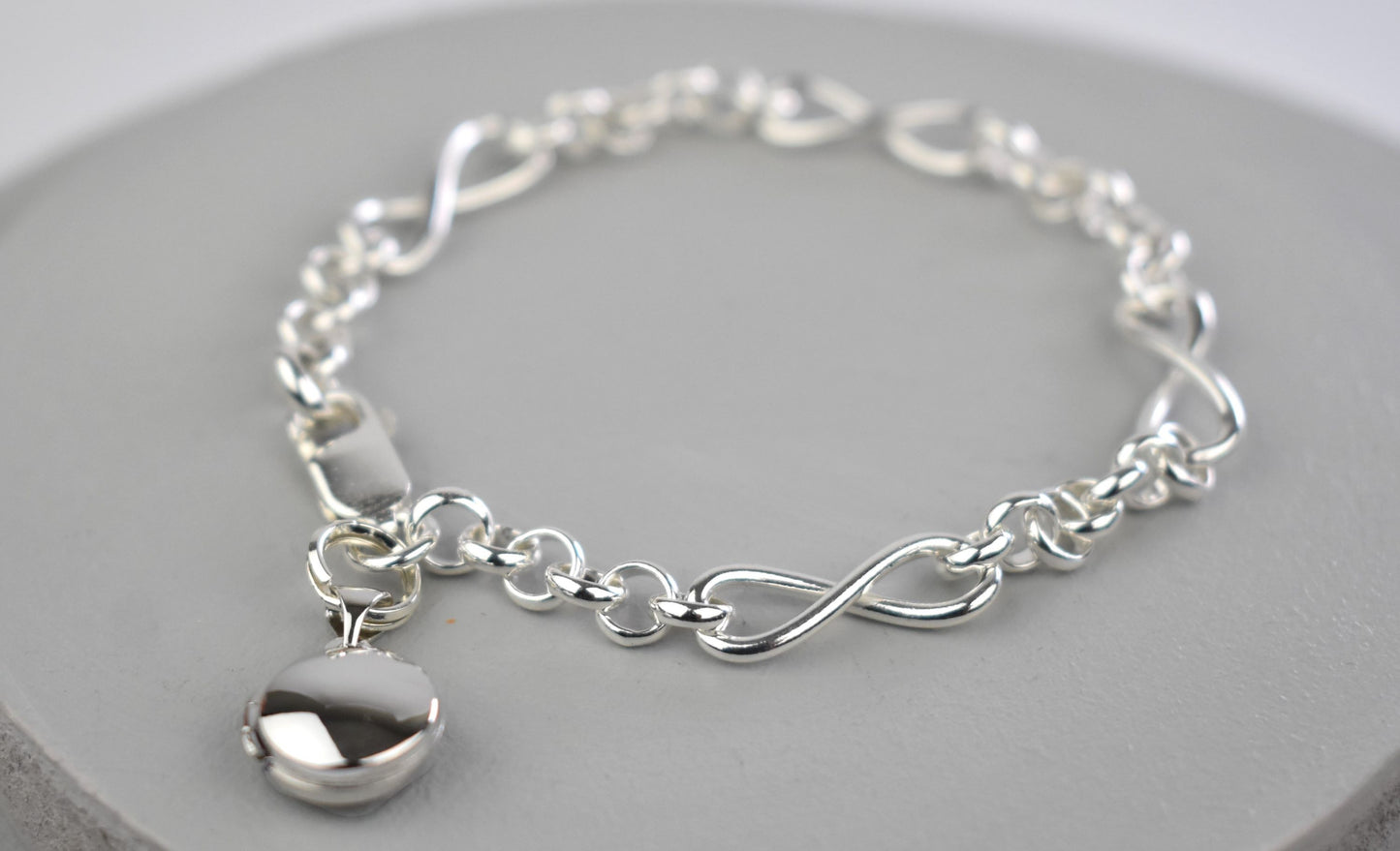 Sterling silver Infinity link bracelet with miniature 10mm sterling silver photo locket