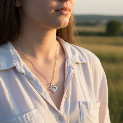 Silver heart shape necklace with crystal cubic zirconia paw print on 18" sterling silver diamond cut chain