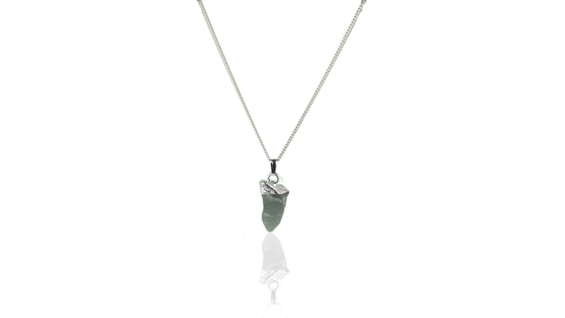 Aquamarine raw crystal pendant with sterling silver tip and suspended from asterling silver chain