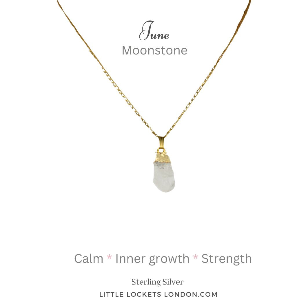 Moonstone pendant with sterling silver gold plated tip suspended from a gold plated sterling silver chain. The pendant is mounted on card with the birth month and stone name and three qualities of the stone - calm, inner growth, strength