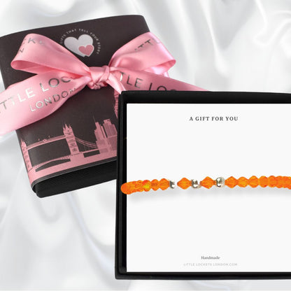 Your gift will arrive mounted on white card with the wroding "A gift for you" and placed in a branded gift box.