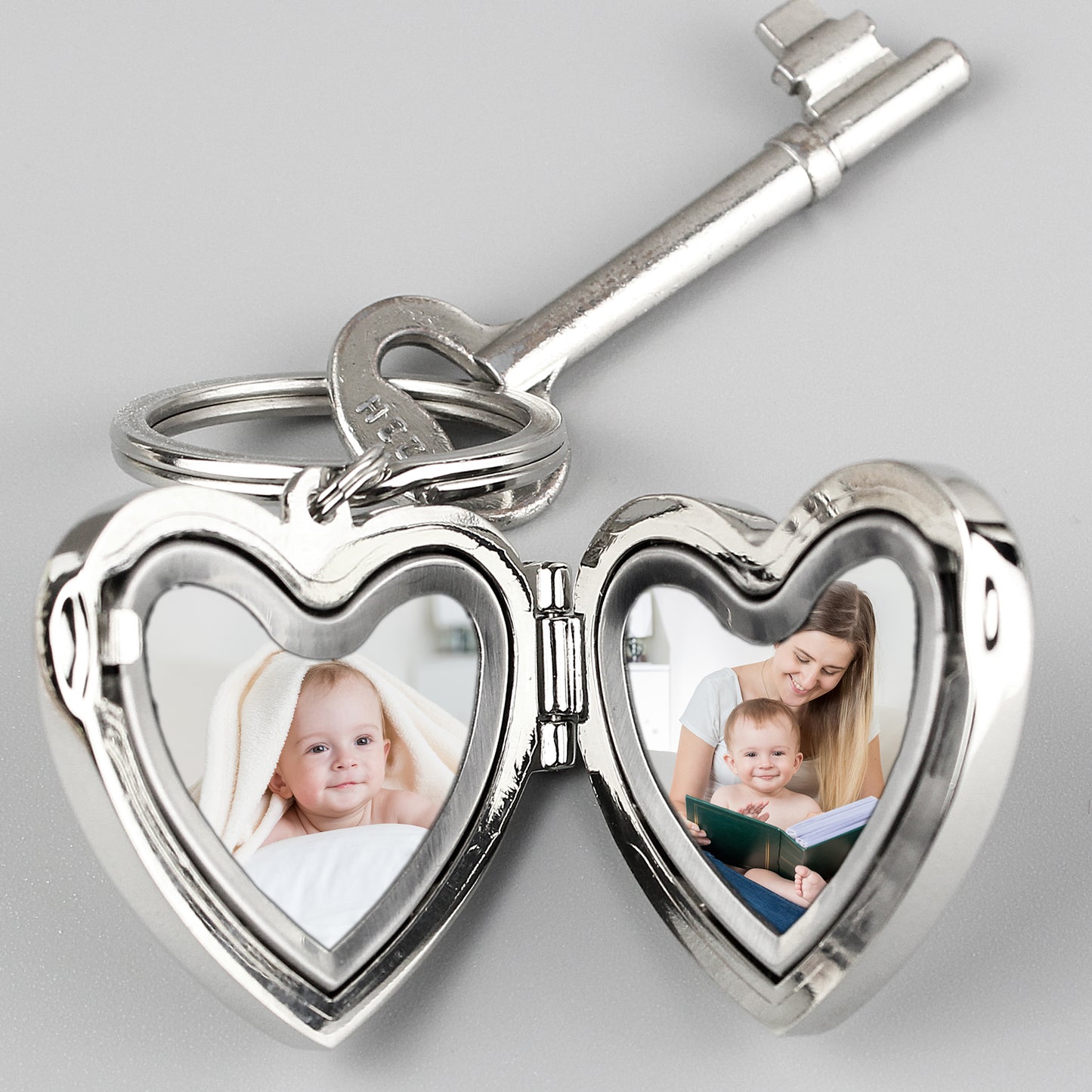 Interior of heart shaped keyring showing two photos