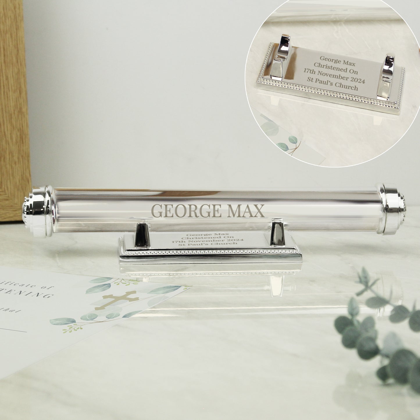 Silver plated certificate holder on a silver plated base shown as containing a baptism cettificate for a baby and engraved with his name christening details