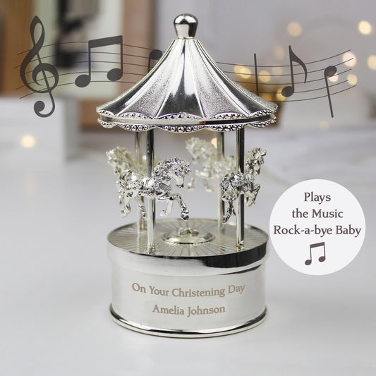 Pretty carousel music box, plays Rock-a-bye baby. Can be engraved with your own message. 