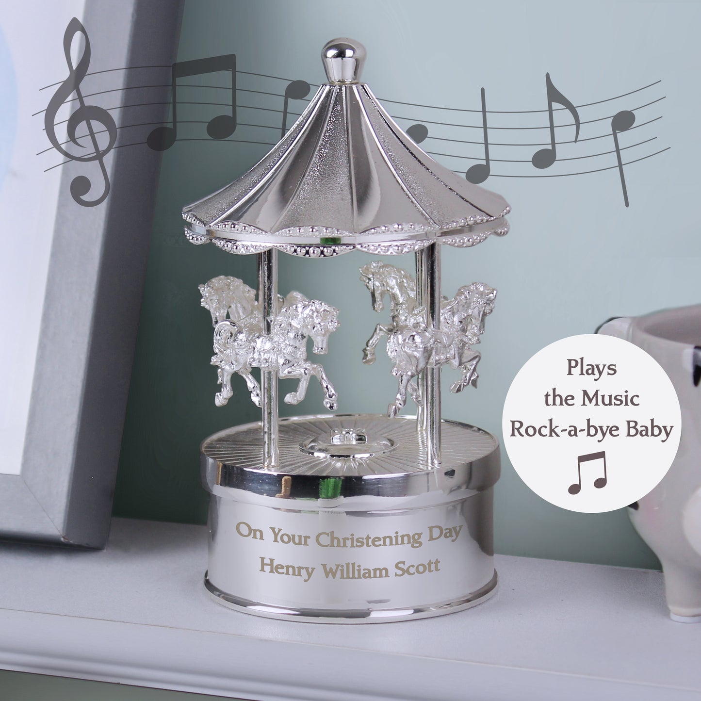 Pretty carousel music box, plays Rock-a-bye baby. Can be engraved with your own message. 