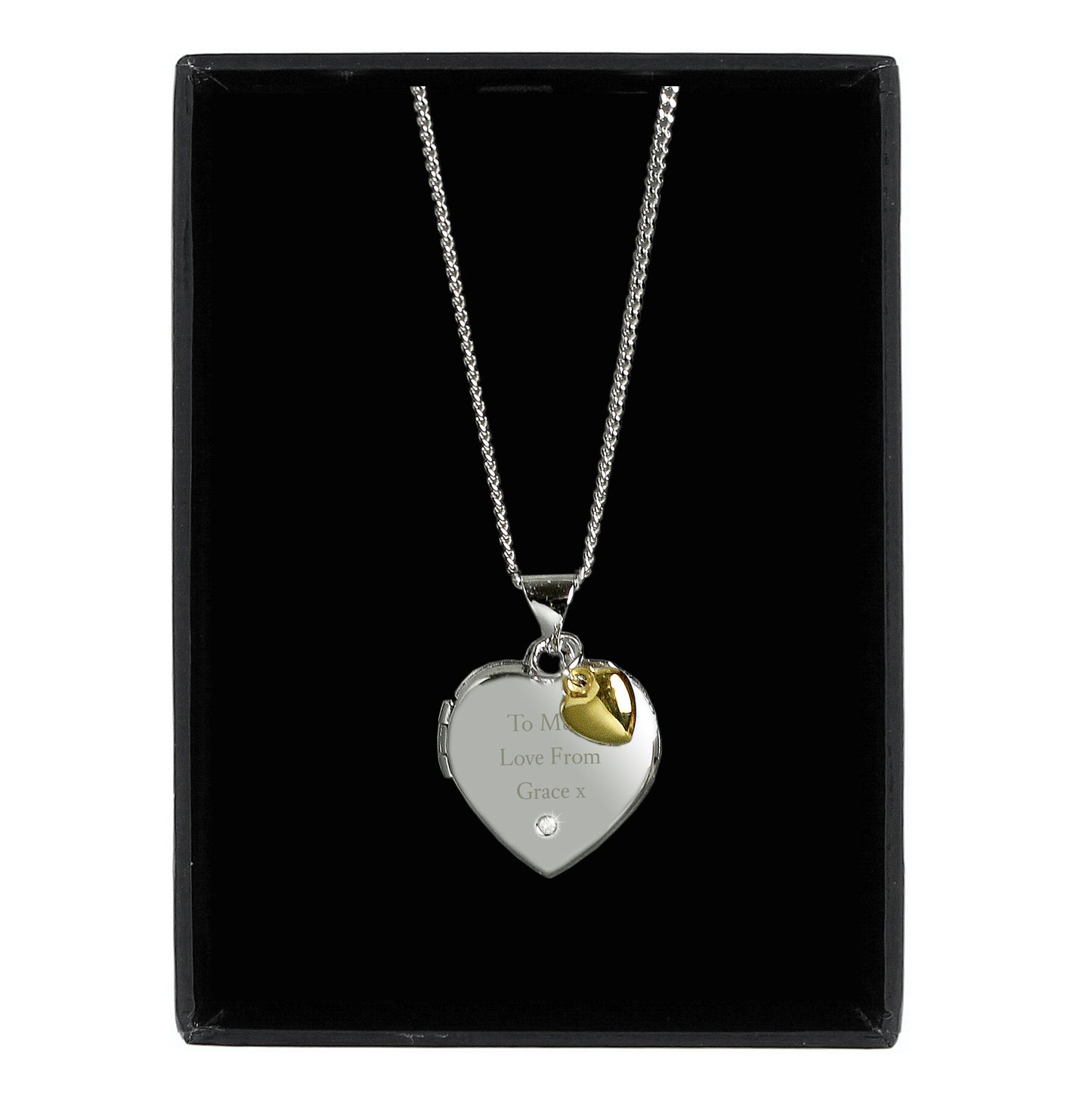 sterling silver heart shaped locket with engraved message and tiny gold heart, in gift box