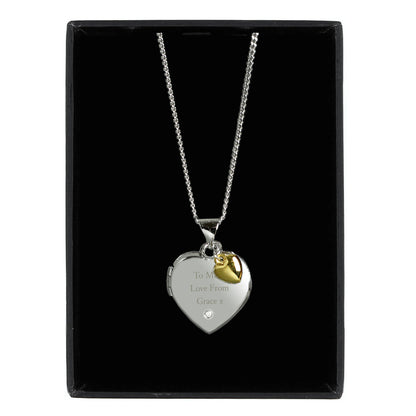 sterling silver heart shaped locket with engraved message and tiny gold heart, in gift box