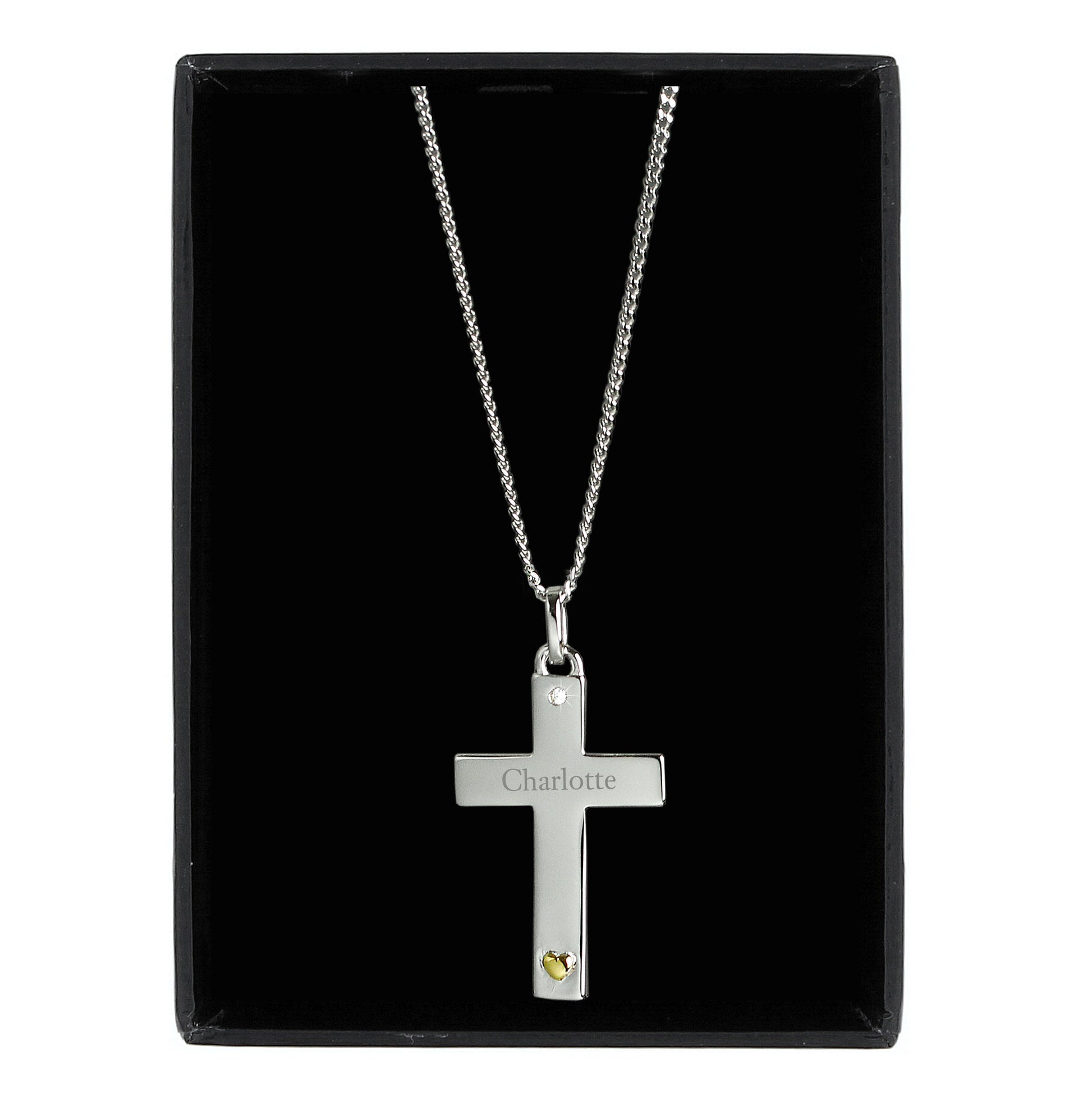 Sterling silver cross suspended from 18" sterling silver chain. The cross has a tiny zircona at the head and a gold plated heart at the foot of the cross. Personalised with a name of your choice. Shown in gift box