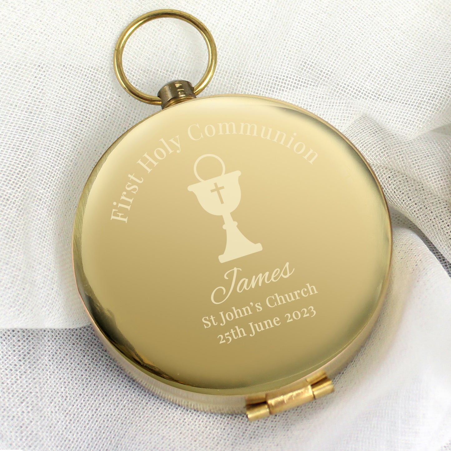 Full compass in brushed metal effect case, engraved with First Holy Communion and an etched chalice with cross. can bepersonalised with a name and message of your choice