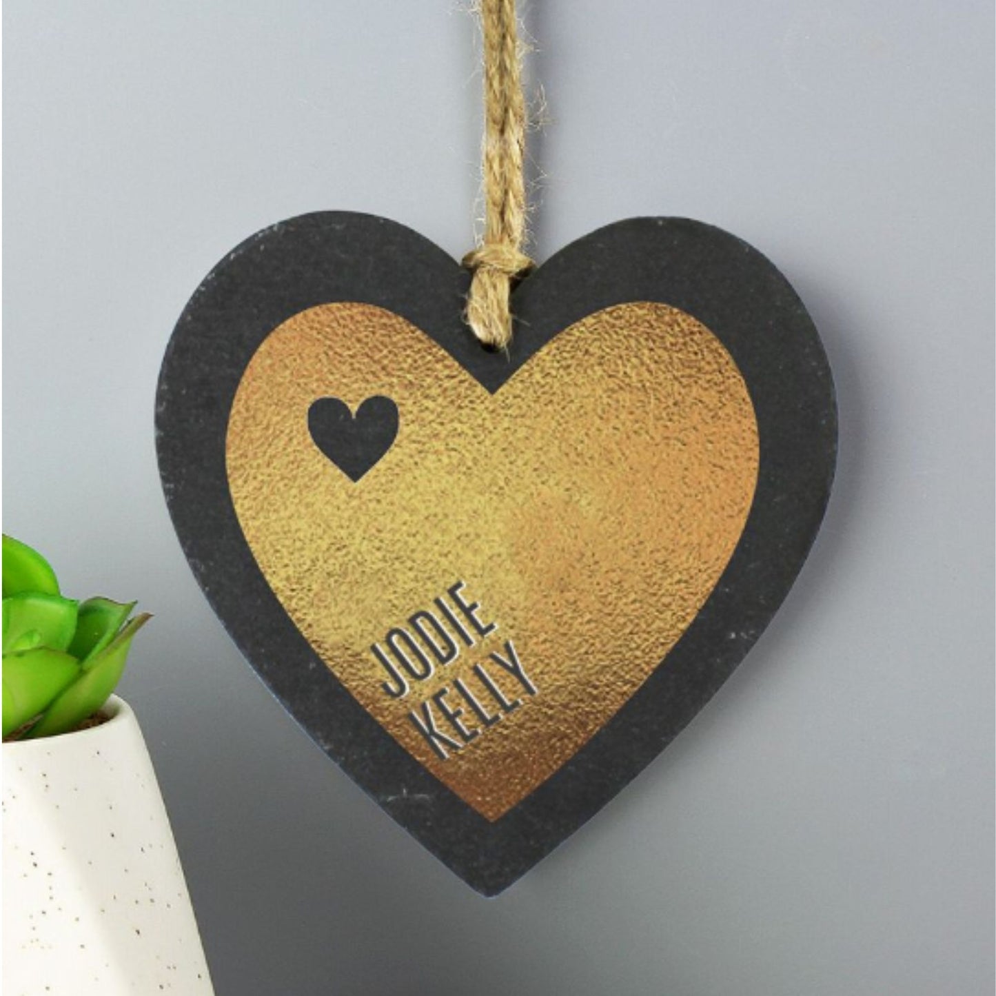 real slate heart finished with gold leaf and flecks of fools gold personalised with two names