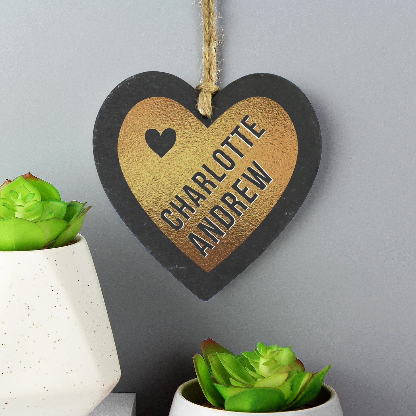 real slate heart finished with gold leaf and flecks of fools gold personalised with two names