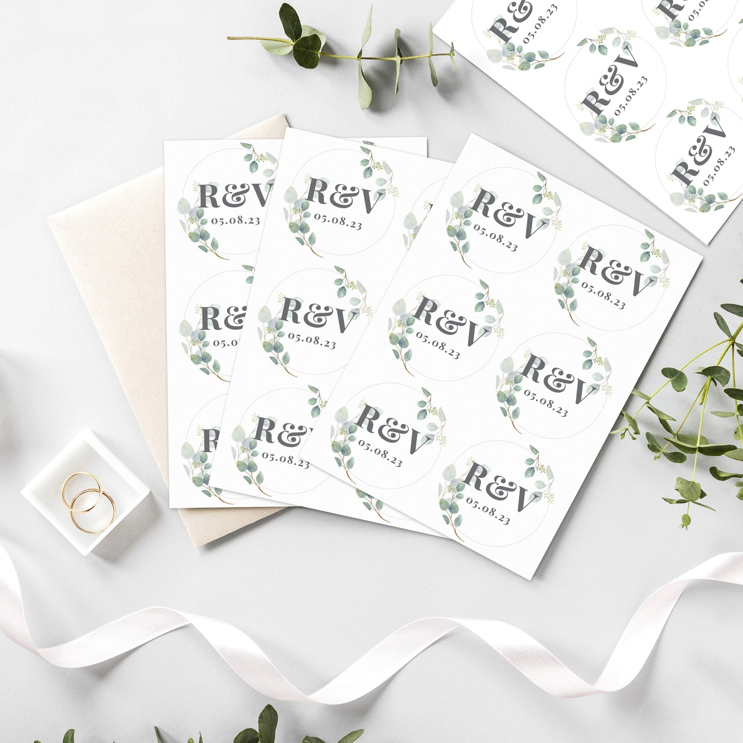 Personalised wedding sticky labels with pretty summer leafe design. Initials with ampersand and wedding date.