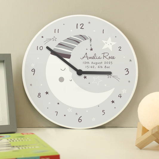 Wooden crescent moon clock with a sleepy moon and star design. Personalise with up to three lines of text.