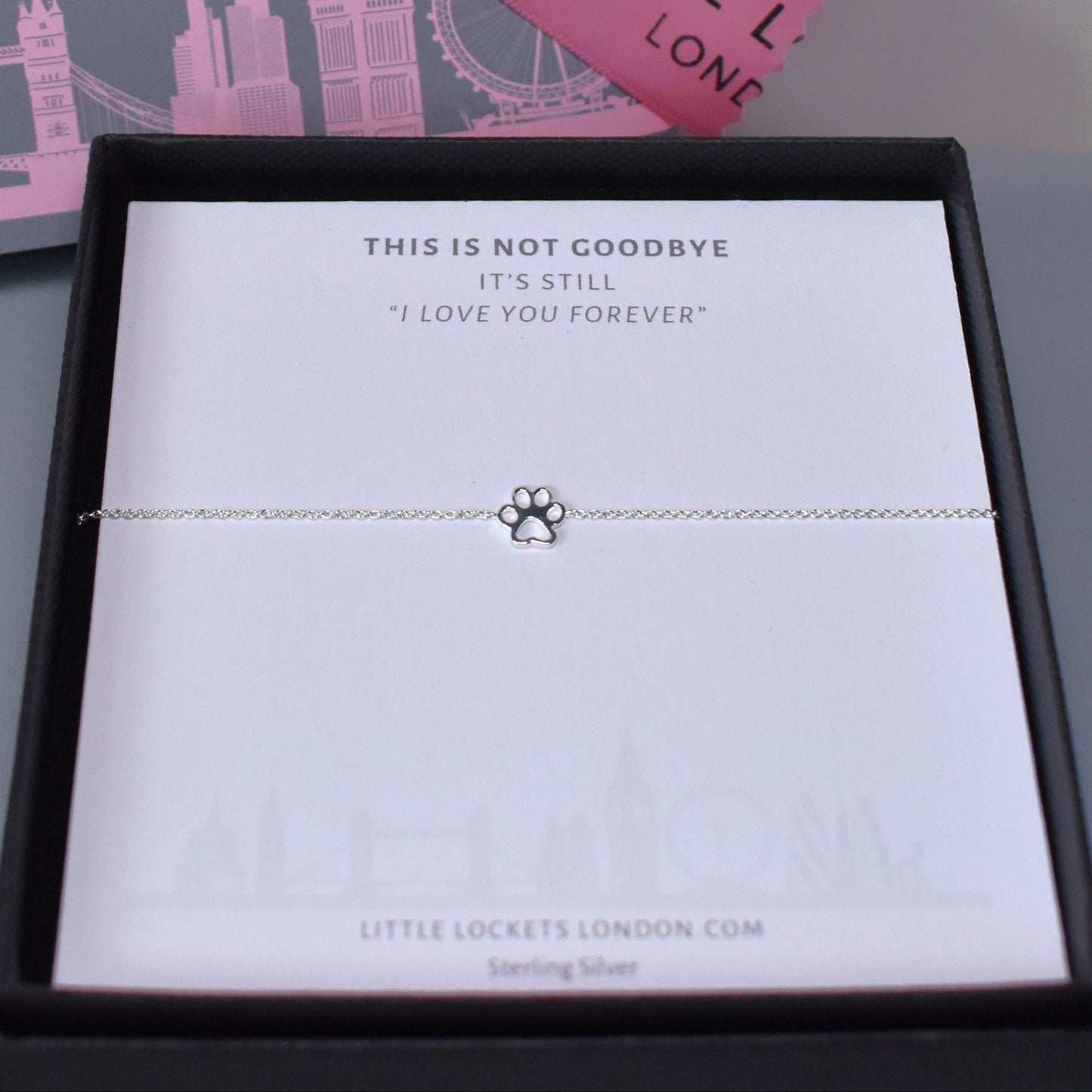 Sterling silver adjustable bracelet with paw print charm in gift box 