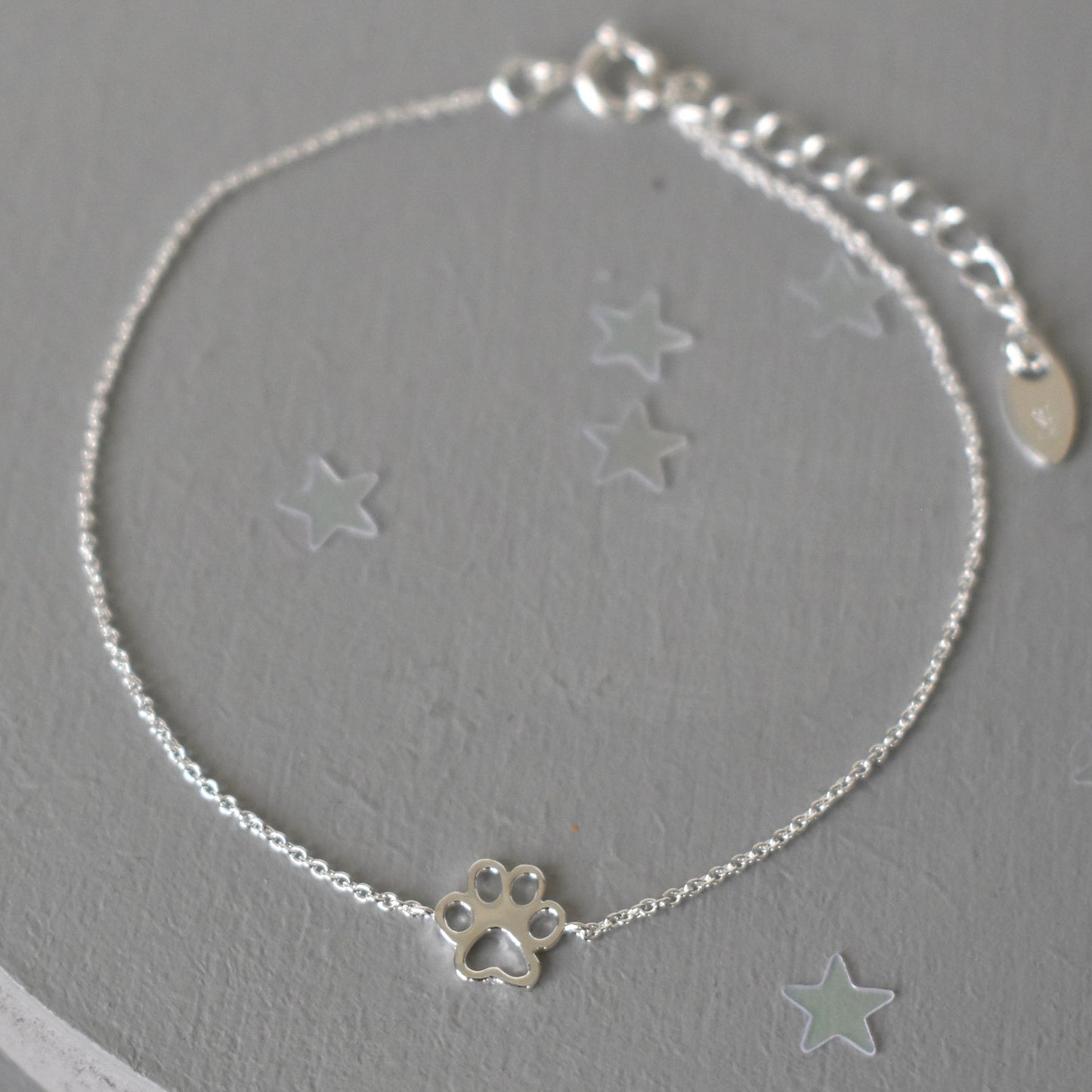 Sterling silver adjustable bracelet with paw print charm