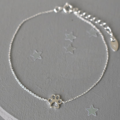 Sterling silver adjustable bracelet with paw print charm