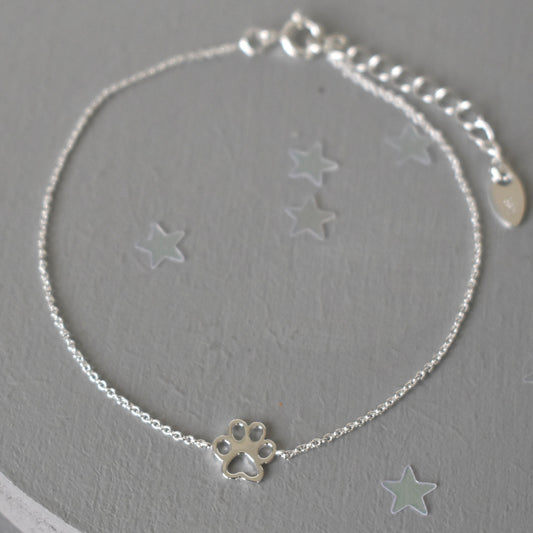 Sterling silver adjustable bracelet with paw print charm