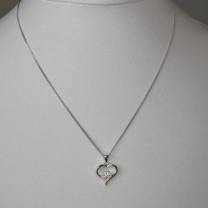 Silver heart shape necklace with crystal cubic zirconia paw print on 18" sterling silver diamond cut chain