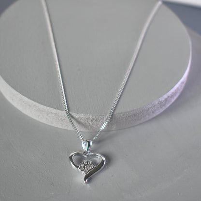 Silver heart shape necklace with crystal cubic zirconia paw print on 18" sterling silver diamond cut chain