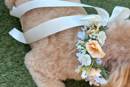 Full Flower Garland Dog Collar. Silk flower dog collar has a blend of buds and blossoms and a hint of woodland greenery, finished with ivory satin ribbon and attached to a white leather collar. Optional Ring Bearer Clasp