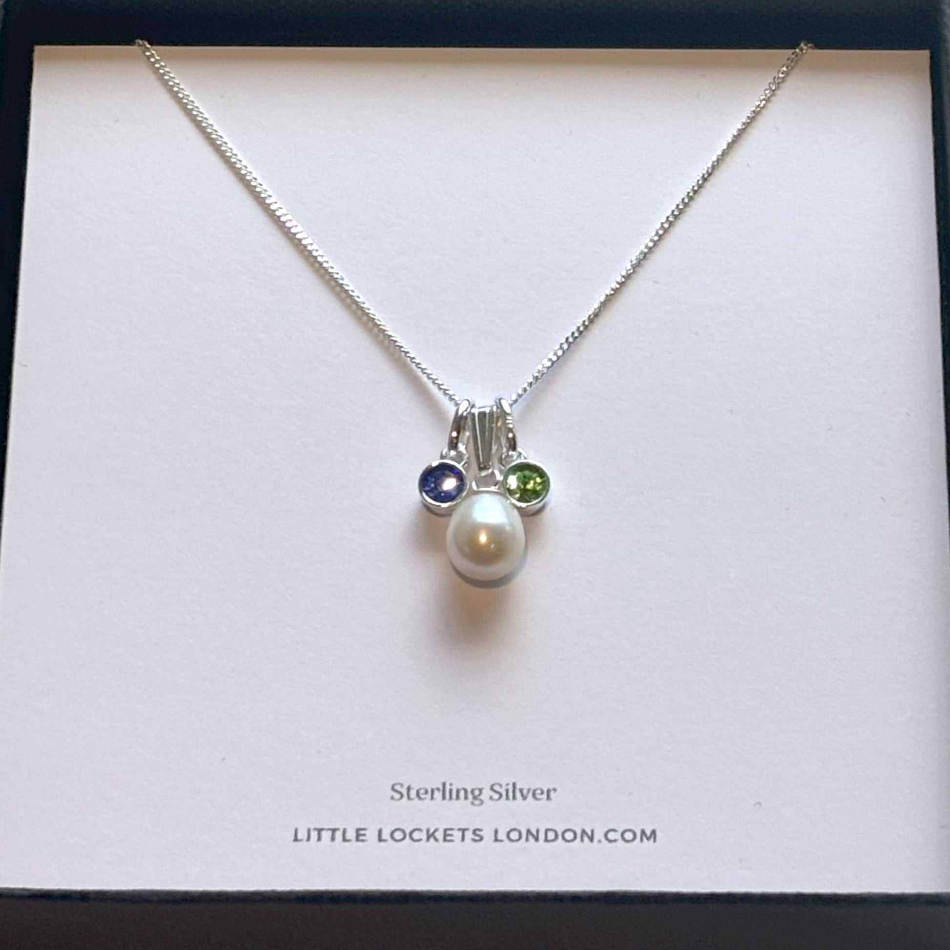 Freshwater pearl necklace with crystal birthstones presented on card in branded gift box
