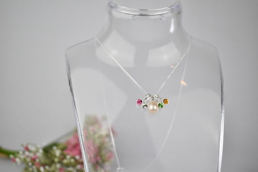 Freshwater pearl drop with four high quality birthstones suspended from an extendable 16-18" sterling silver chain