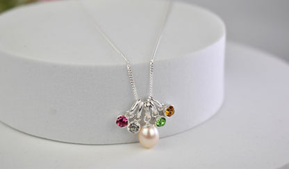 Freshwater pearl drop with four high quality crystal birthstones suspended from an extendable 16-18" sterling silver chain
