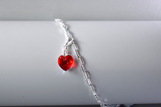 Sterling silver paperclip anklet with high quality crystal heart charm in your choice of colour. shown in red.