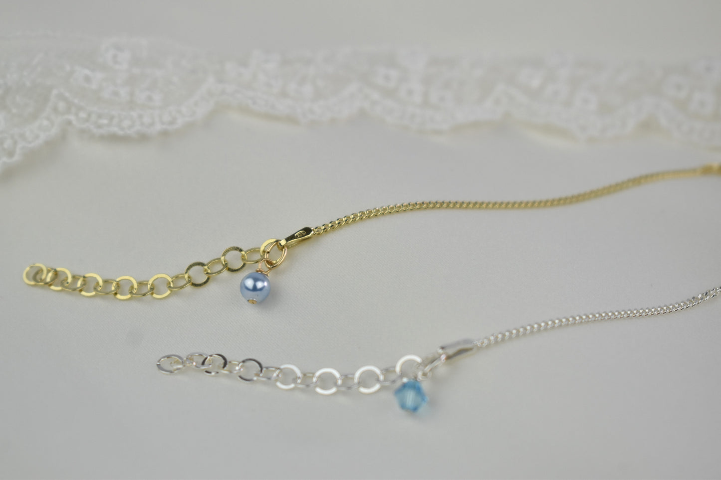Something Blue anklet available in your choice of sterling silver or sterling silver with gold plating. Choice of blue pearl or blue crystal to finish your anklet.