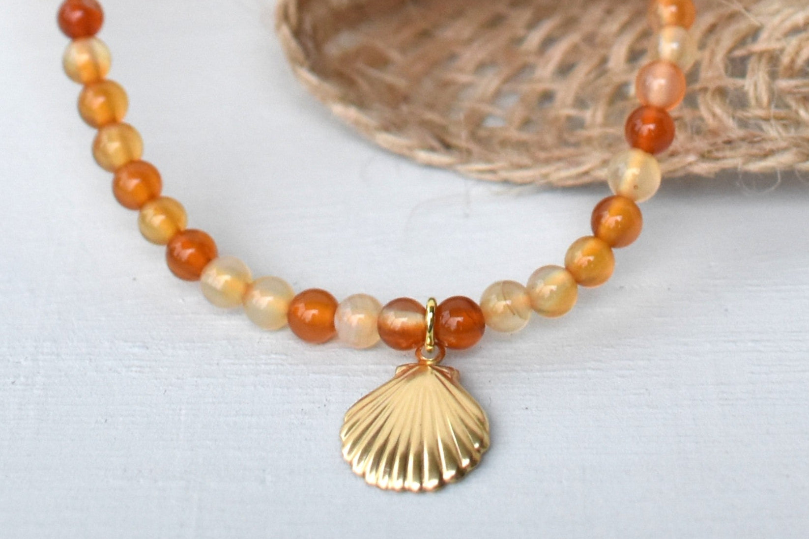 Carnelian elasticated bracelet with sterling silver gold plated shell