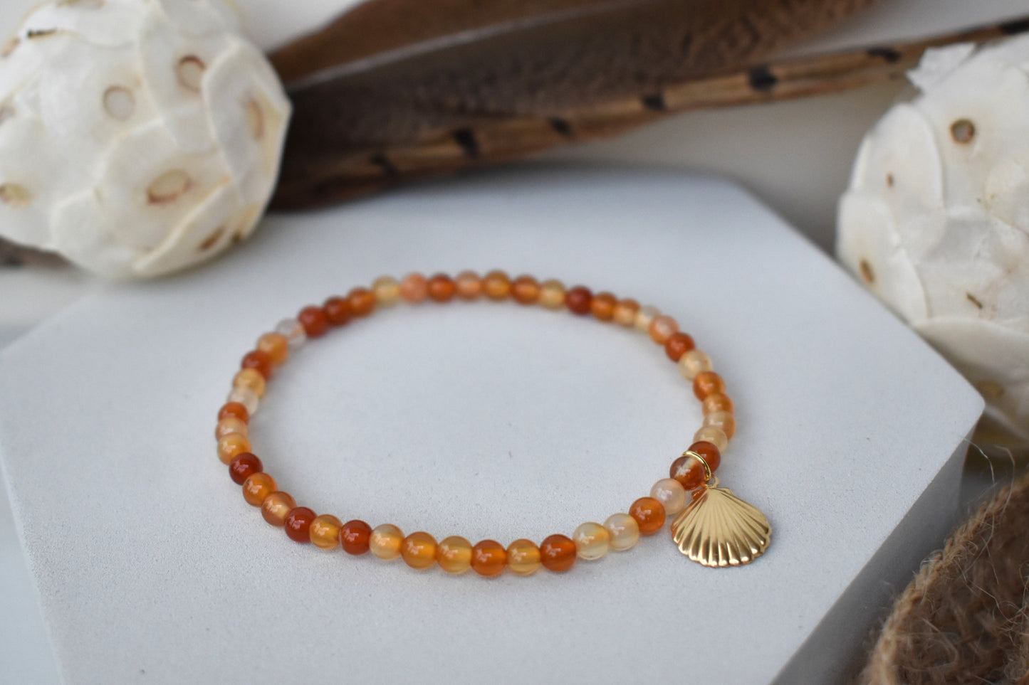 Carnelian elasticated bracelet with sterling silver gold plated shell