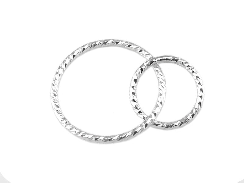 Sterling silver entwined circles, cut to give an extra sparkle.
