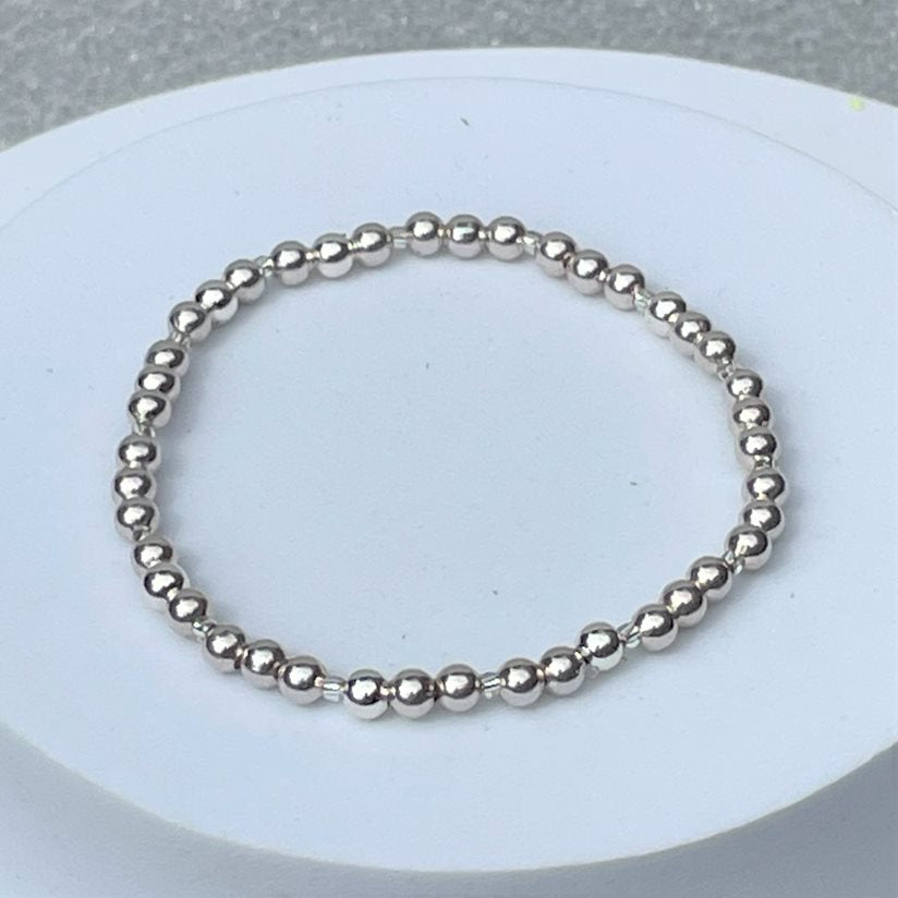 Stack your bracelets with our silver plated bead bracelet which is interspersed with even tinier silver beads.
