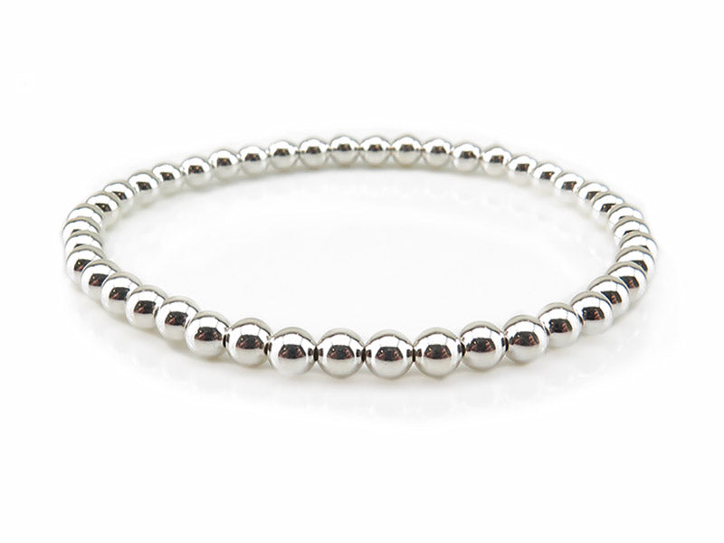 Choose the plain sterling silver option. 4mm beads on elastic, no spacers, just plain and simple, but elegant!