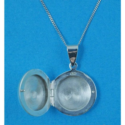 Interior of round sterling silver locket