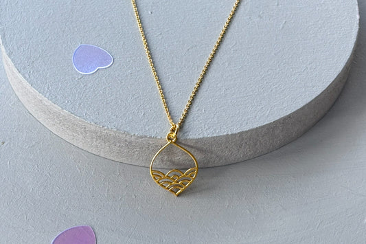 Close up of Gold Plated Sterling silver  Calm Seas Ocean Wave Pendant