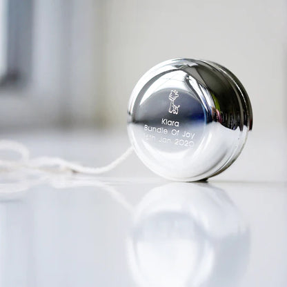 Nickel plated yoyo with your choice of icon and engraved with your own message, both sides can be engraved