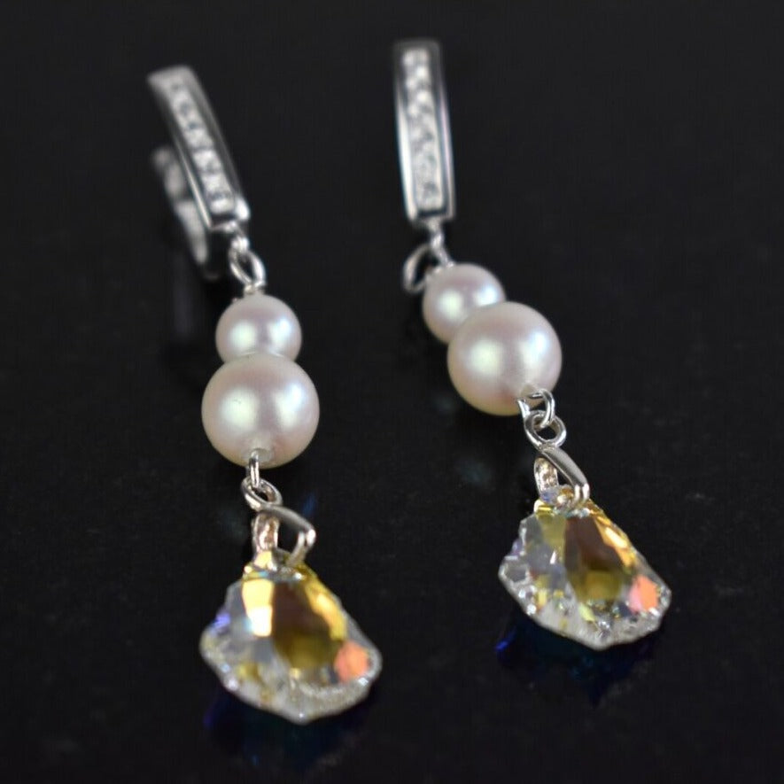 Sterling silver diamante lever back wires hold two freshwater ivory pearls and a sparkling Baroque highest quality Austrian crystal.